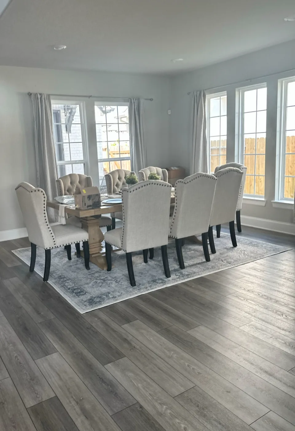Dining room table, chairs and wood floors cleaned in a Houston-area home